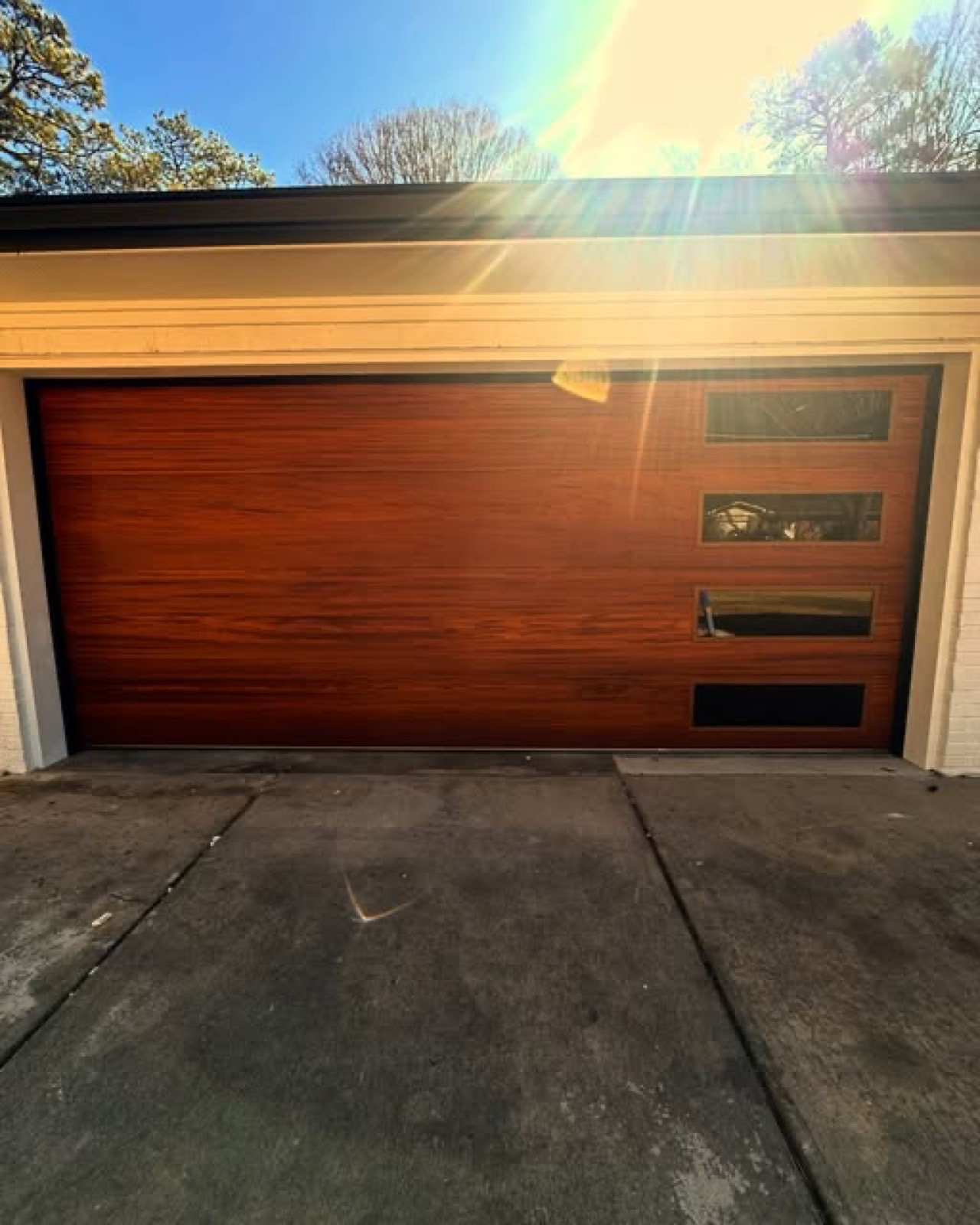 Modern wood-look garage door from the Snow Garage Door project archive